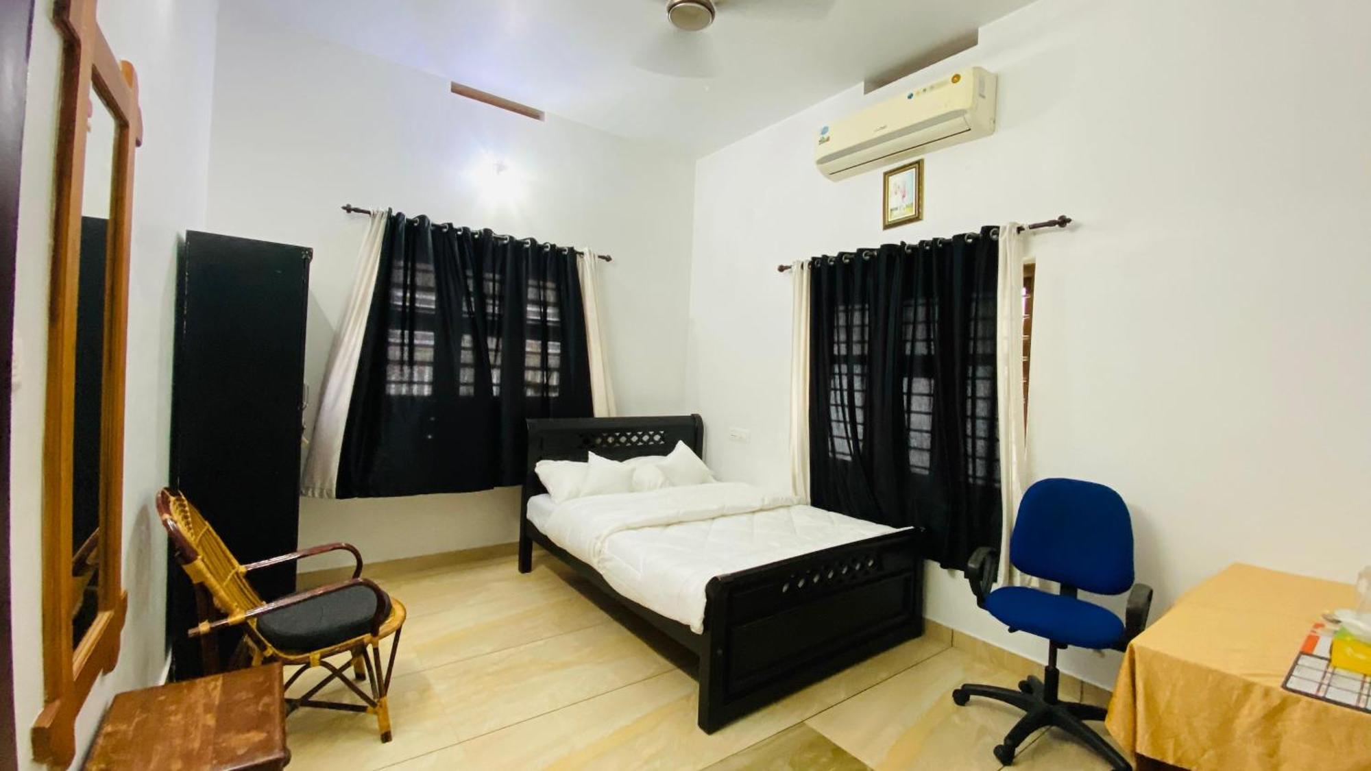Green Island Homestay Riverside Calecute Quarto foto